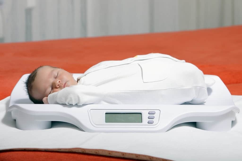 Baby on a weighing scale