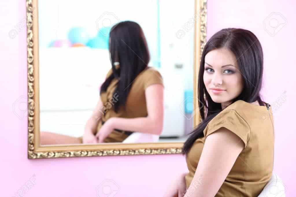 Model Sitting In Front Of Mirror 3
