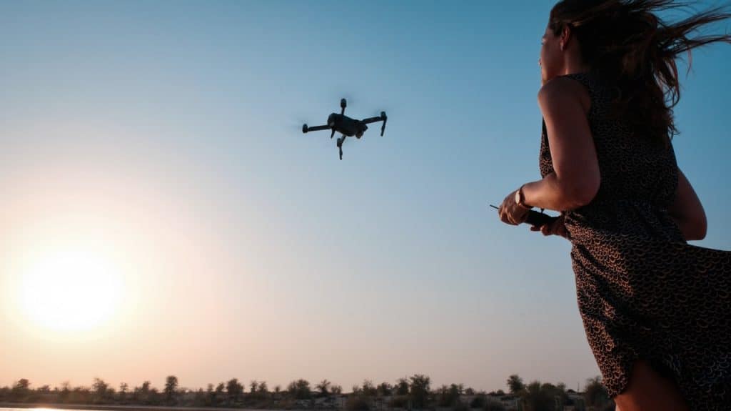 girl piloting a drone