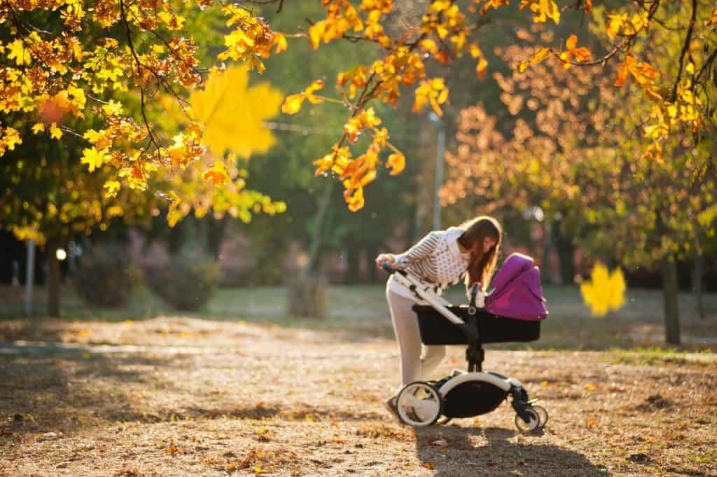 Photo of a woman and a baby in a stroller