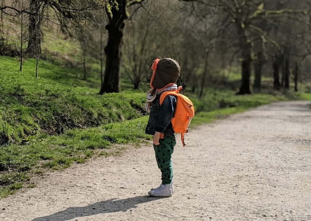 kid with orange backpack