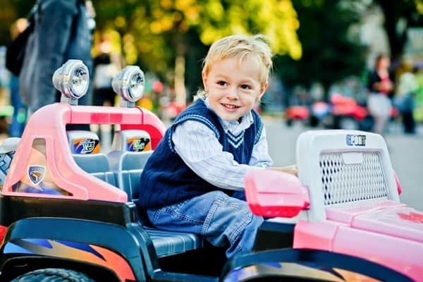 Little Boy Driving Toy Car 1