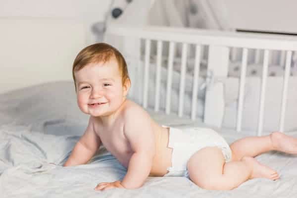 Baby Wearing Diaper and smiling