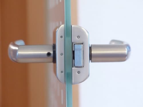 What's the best way to childproof these types of door handles? : r