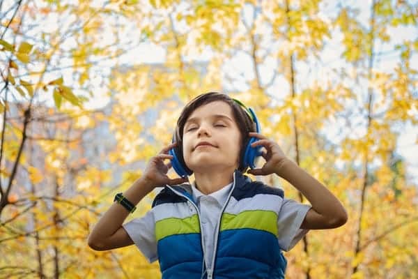 Boy listening in headphones