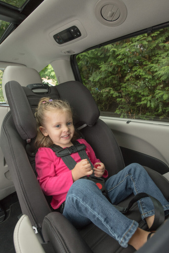 Little girl in a rear facing car seat